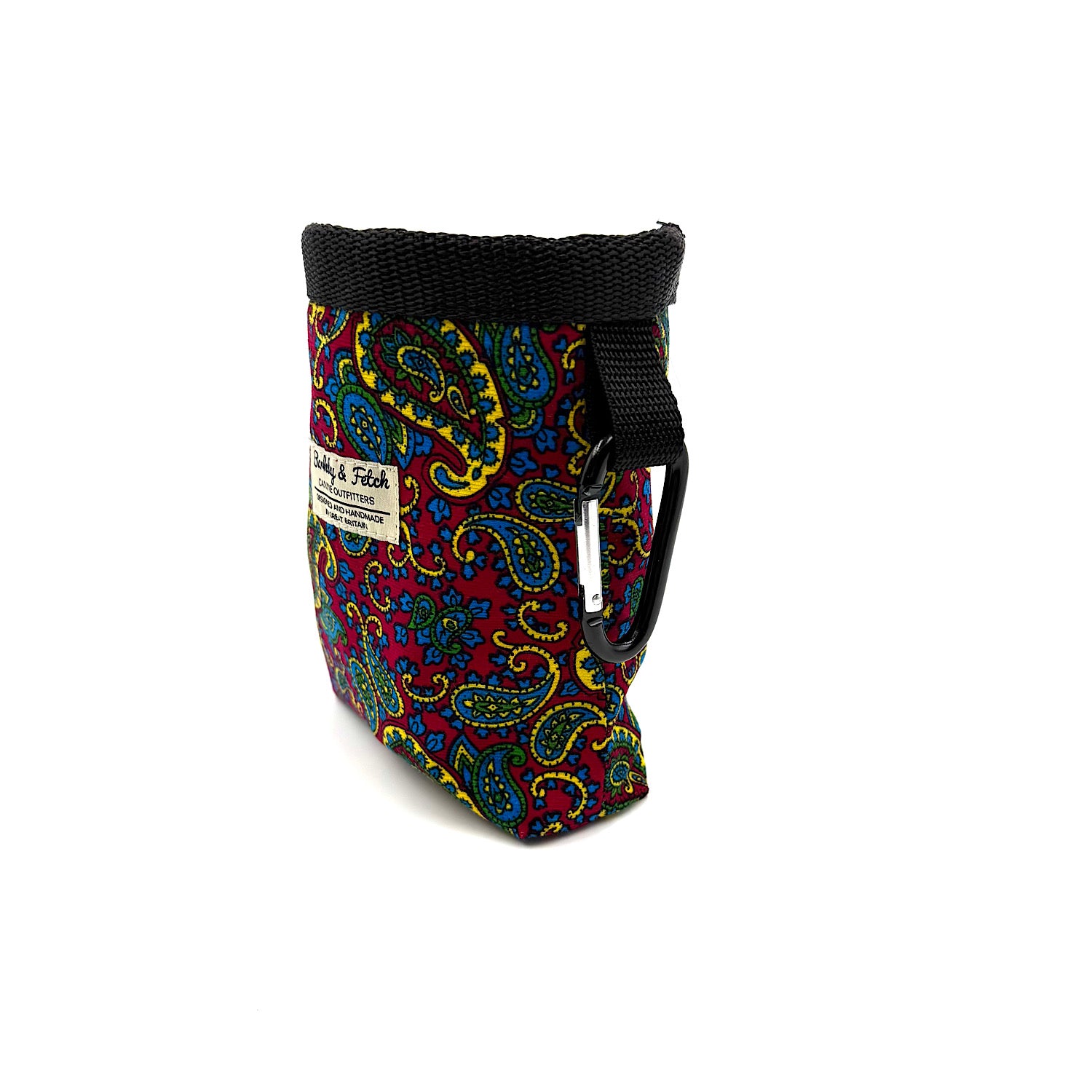Colorful paisley-patterned bag with a black strap on a white background handmade by Barkley and Fetch UK