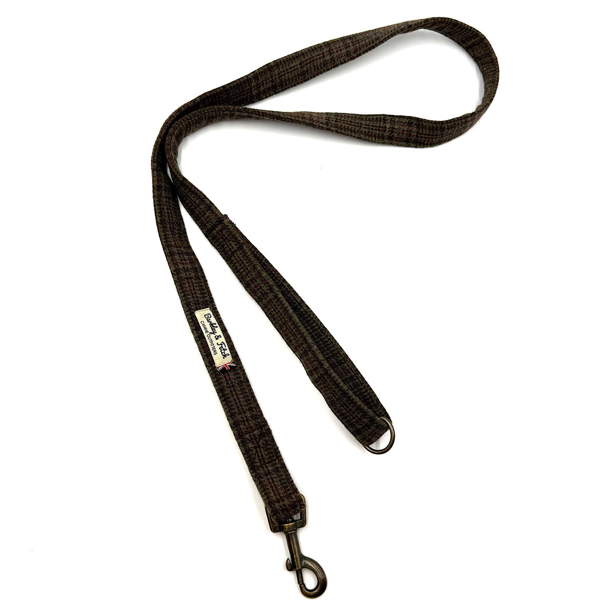 A dark brown plaid dog leash with a metal swivel snap hook, shown on a plain white background. Handmade in Great Britain by Barkley and Fetch.
