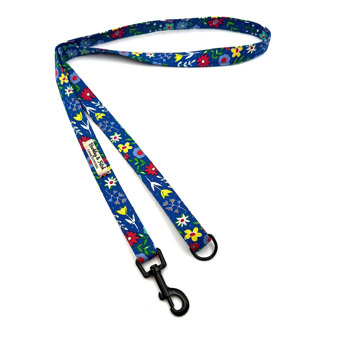 Colorful floral-patterned dog leash on a white background