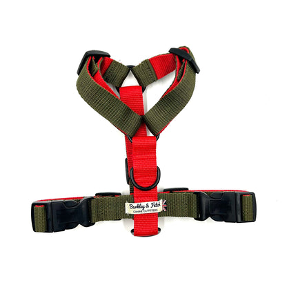 Red and green dog harness with black buckles on a white background handmade in the UK by Barkley And Fetch