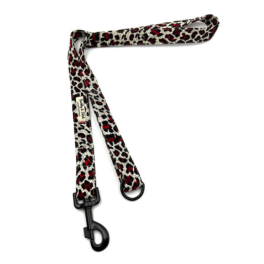 Leash with leopard print pattern on a white background