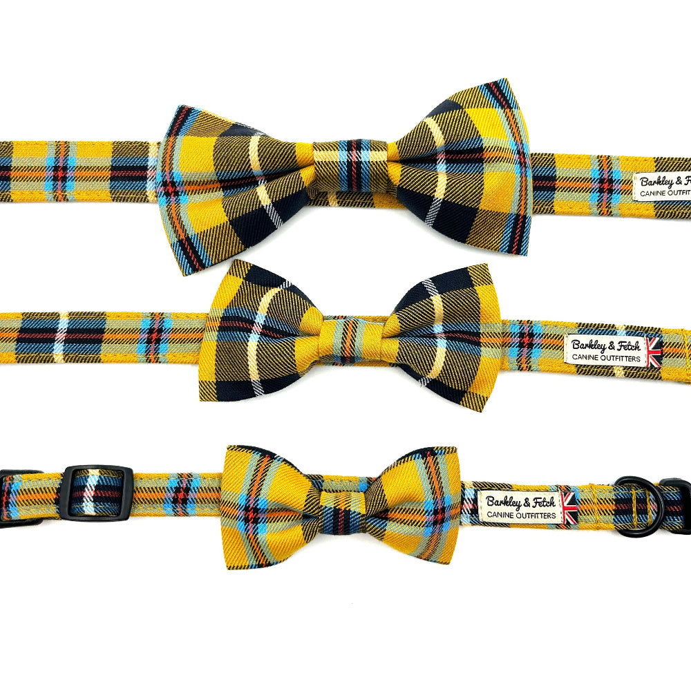 Set of three yellow and black plaid dog collars with matching bow ties on a white background.