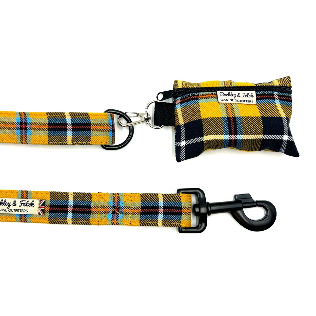Plaid dog leash and bag set with visible brand on a white background