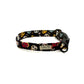 Dog collar with skull and crossbones pattern on a white background