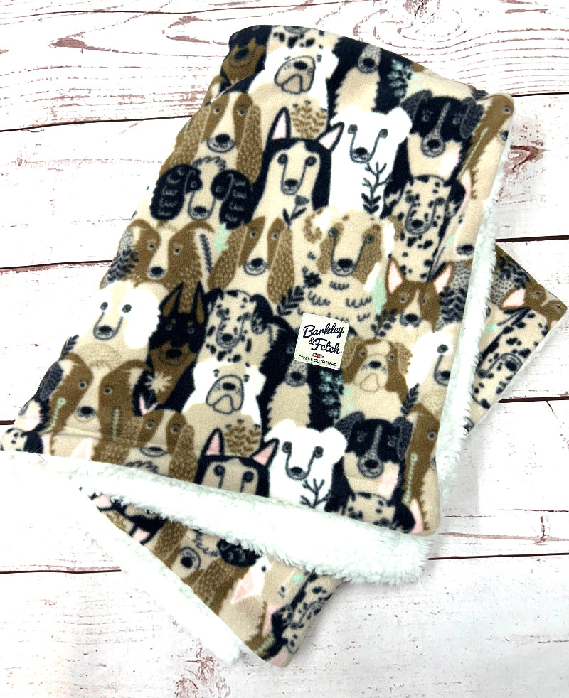 Blanket with dog pattern on a wooden surface handmade by Barkley and Fetch UK