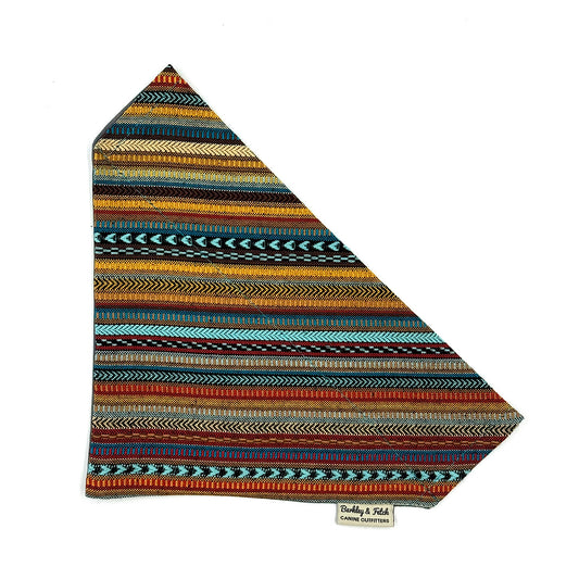 Multicolored striped fabric with a brand label on a white background