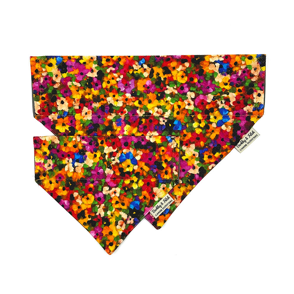 Colorful floral patterned bandana on a white background handmade by Barkley And Fetch