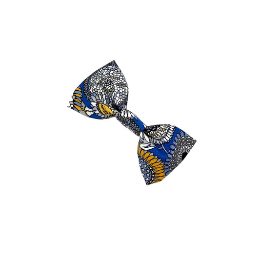 Colorful bow tie with a pattern on a white background