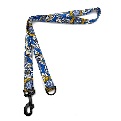 Dog leash with floral pattern on a white background