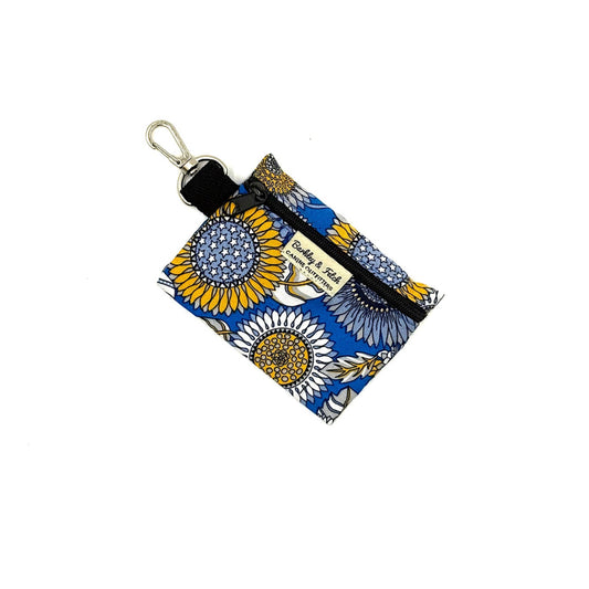 Keychain pouch with sunflower pattern on a white background