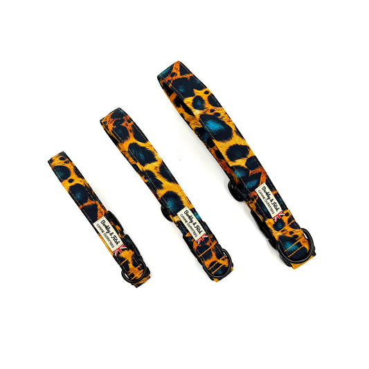 Three leopard print dog collars of different sizes on a white background. Handmade in UK by Barkley and Fetch