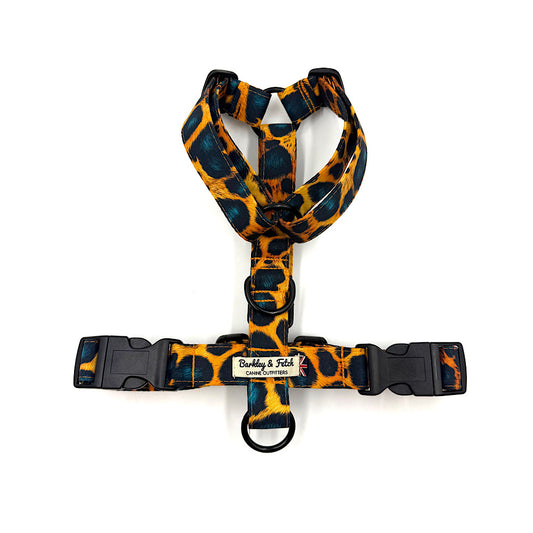 Dog harness with leopard print pattern on a white background. Handmade in UK by Barkley and Fetch