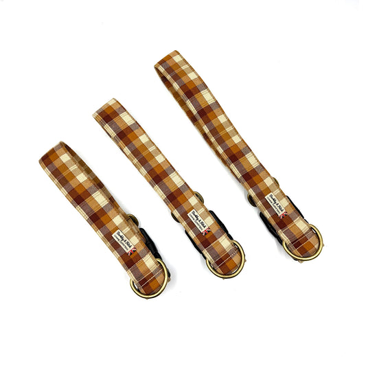 Three plaid dog collars on a white background handmade by Barkley and Fetch UK