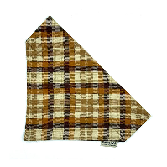 Plaid patterned fabric triangle with brand label on a white background