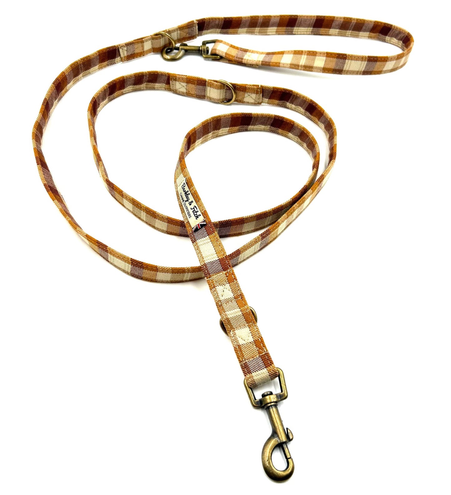 Plaid patterned dog leash on a white background