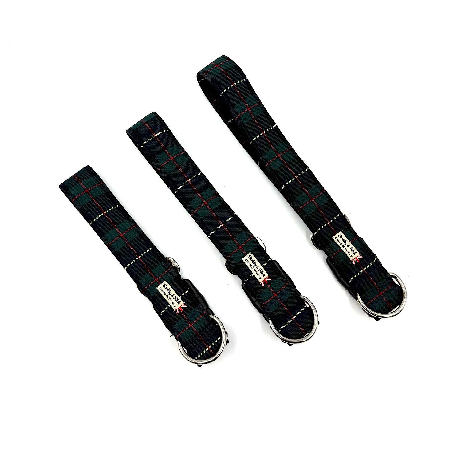 Three black plaid dog collars with metal buckles on a white background handmade by Barkley and Fetch UK