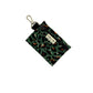 Green leopard print pouch with a keychain on a white background
