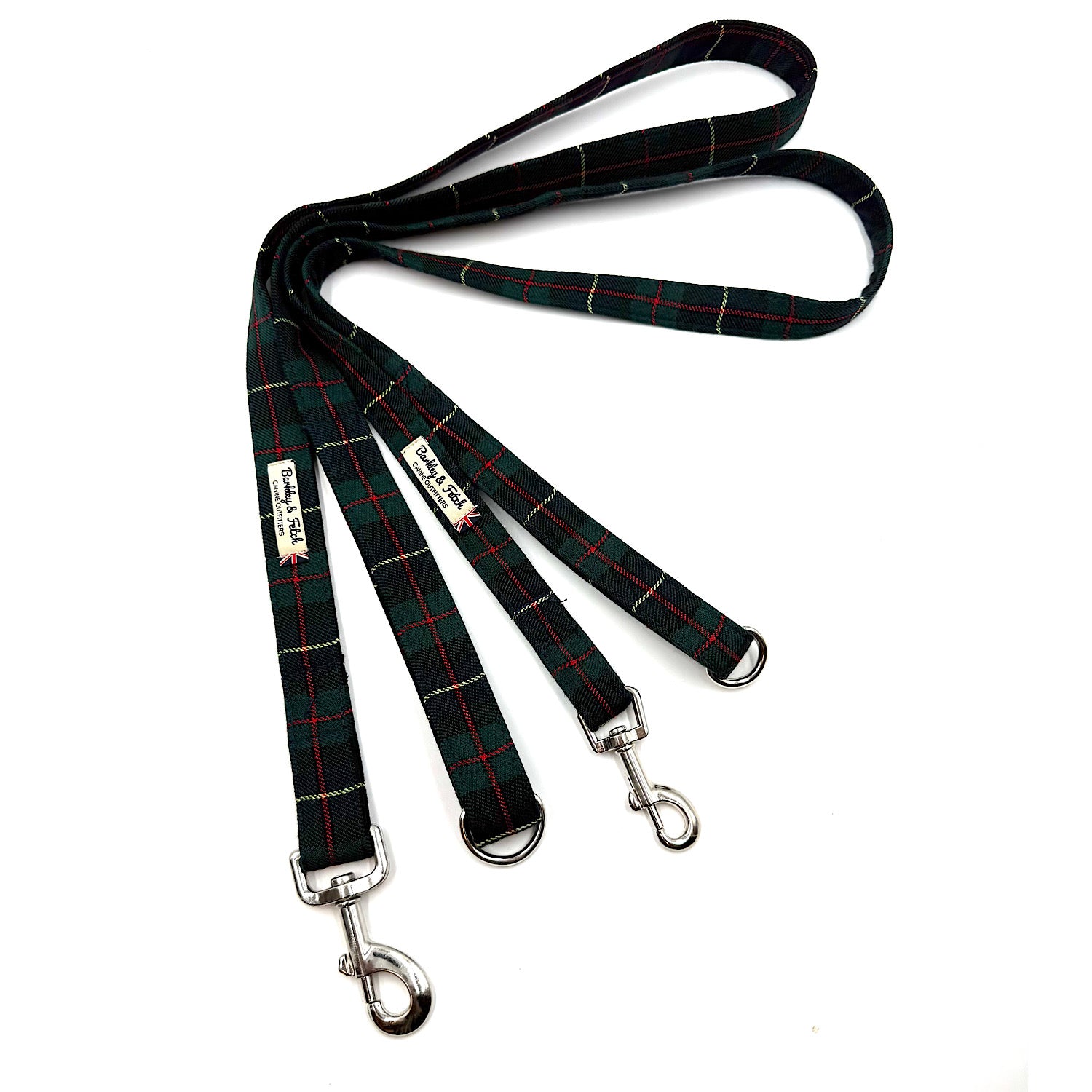 Plaid dog leash with metal clips on a white background
