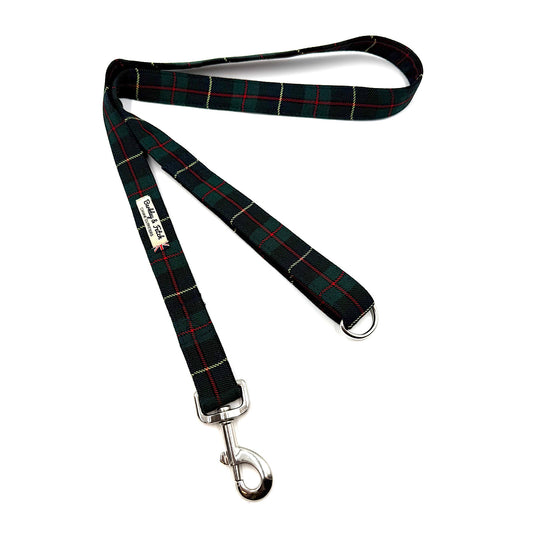 Plaid dog leash with metal clip on a white background