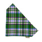 Plaid dog bandana with green, purple, and white colors on a white background