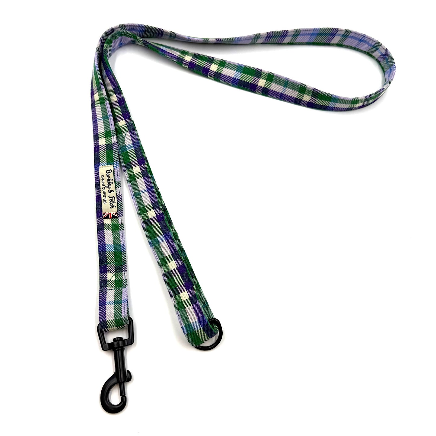 Plaid dog leash with a clip on a white background