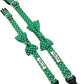 Green polka dot bow tie and suspenders set on a white background