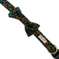 Dog collar with a bow tie featuring star pattern on a green background handmade by barkley and fetch uk