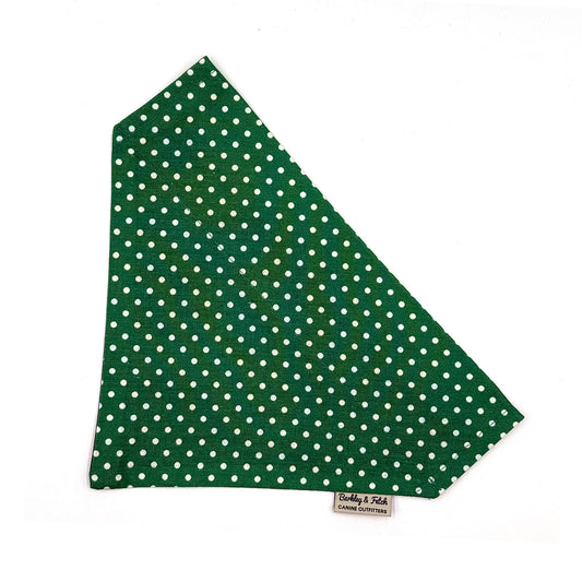 Green bandana with white polka dots on a white background