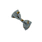 Gray bow tie with black and yellow pattern on a white background