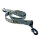 Grey dog leash with a pattern of bees and a metal trigger hook on one end handmade by barkley and fetch uk
