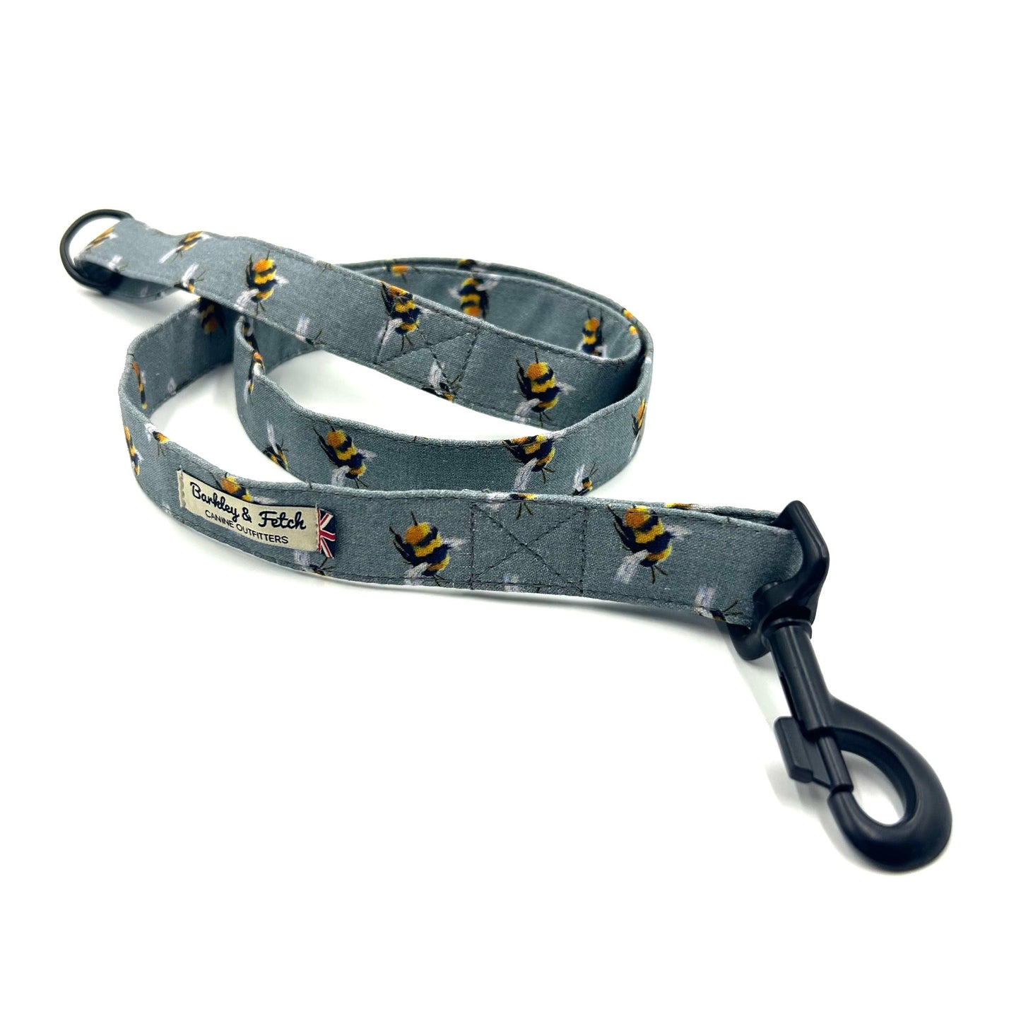 Grey dog leash with a pattern of bees and a metal trigger hook on one end handmade by barkley and fetch uk