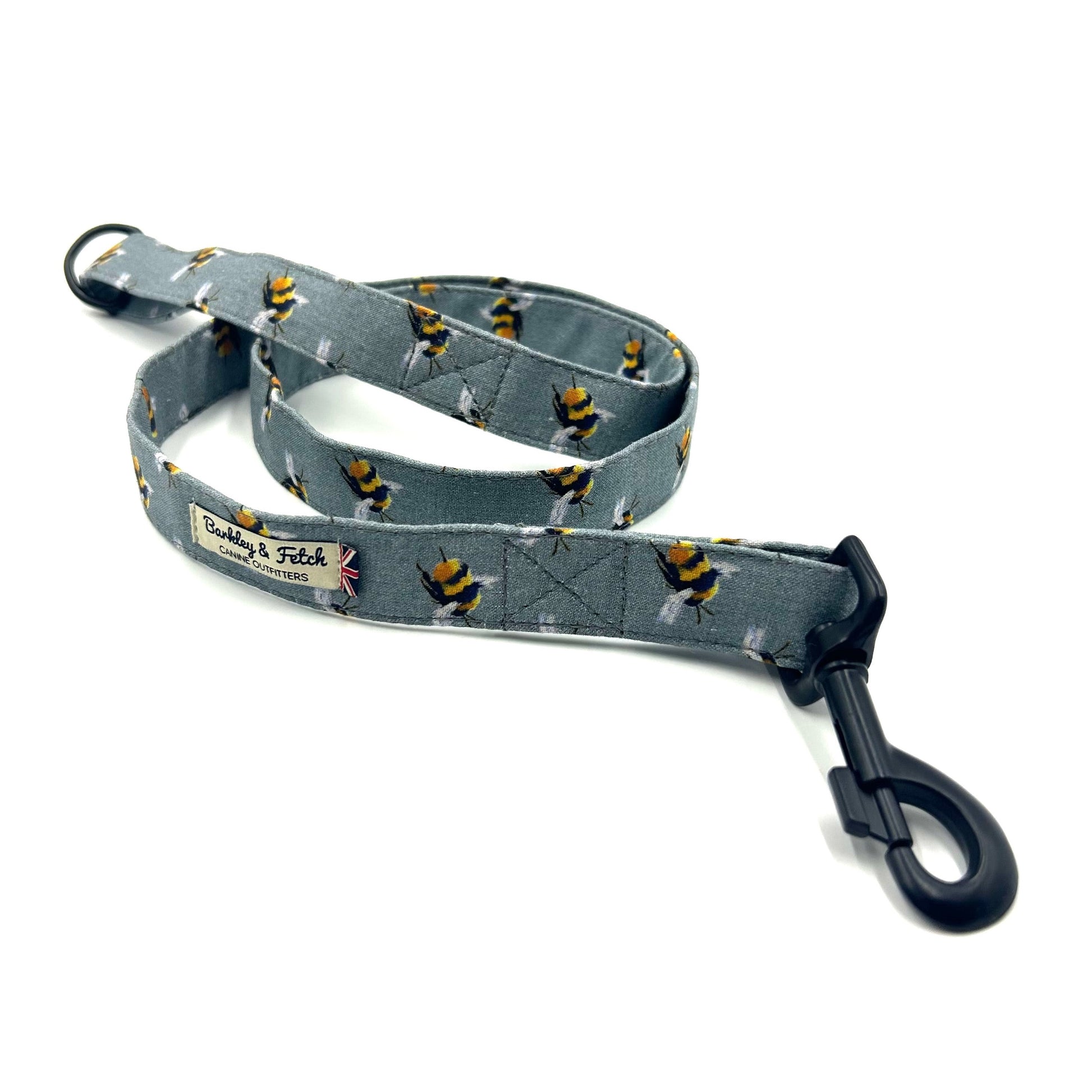 Grey dog leash with a pattern of bees and a metal trigger hook on one end handmade by barkley and fetch uk