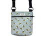 Crossbody bag with bee pattern on a gray background handmade by barkley and fetch uk