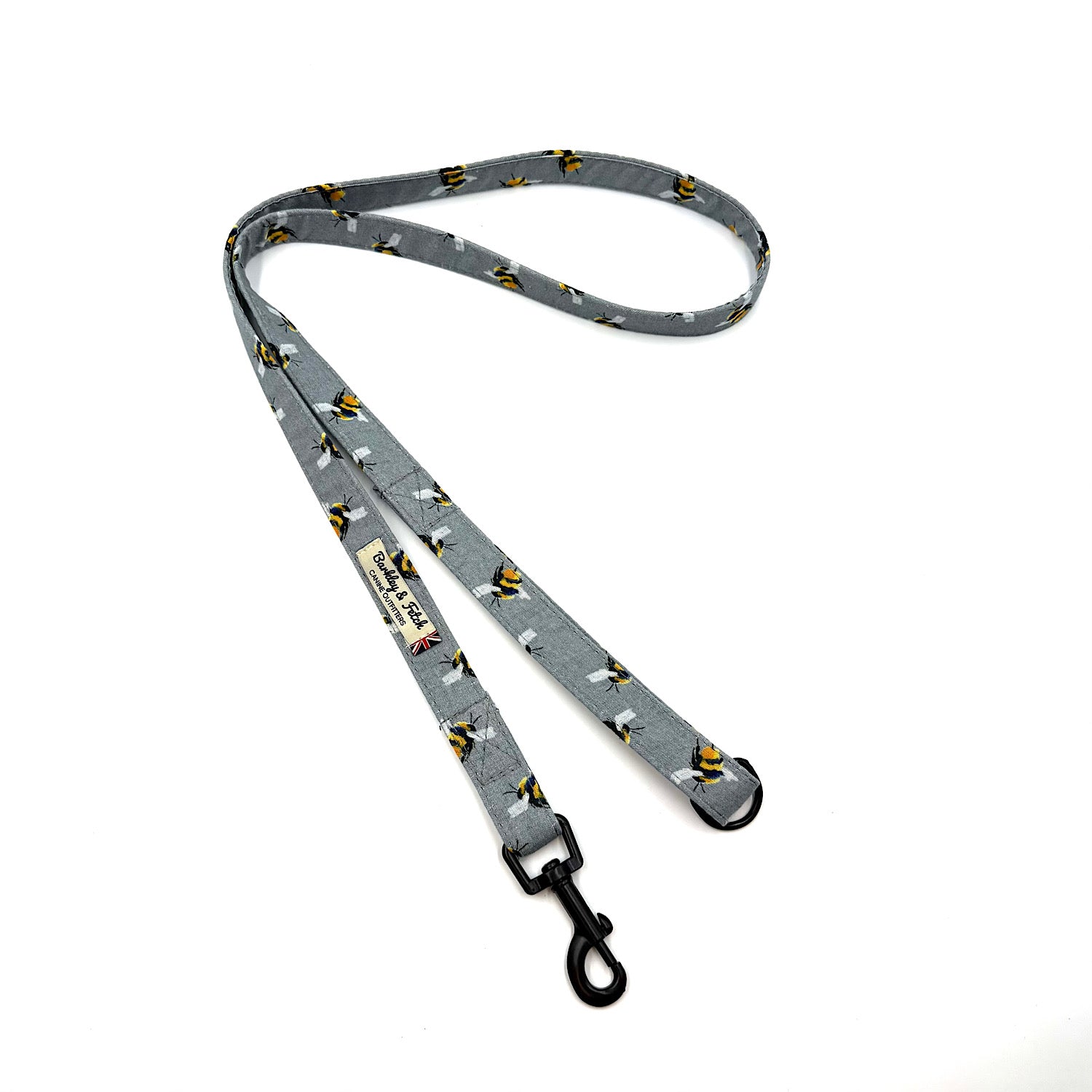 Dog leash with bee print pattern on a white background. Handmade in the uk by Barkley and Fetch