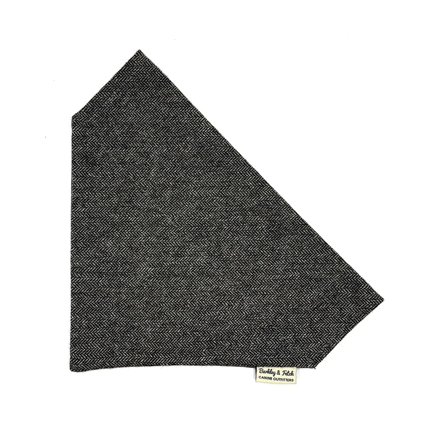 Dark gray herringbone patterned fabric on a white background