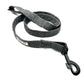 A grey herringbone pattern dog lead with a metal trigger hook and a D-ring on the handle.
