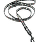 Plaid patterned dog leash on a white background