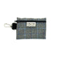 A gray windowpane check poo bag holder with a black zipper and clip, branded by Barkley & Fetch.