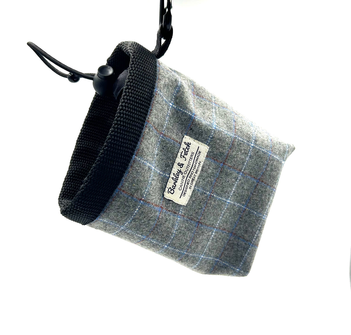 Gray checkered pouch with a black strap and visible brand label on a white background handmade in the UK by Barkley and Fetch