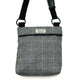 Gray checkered crossbody bag with a strap on a white background handmade in the UK by Barkley and Fetch