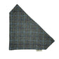 Tweed fabric sample with a check pattern on a white background