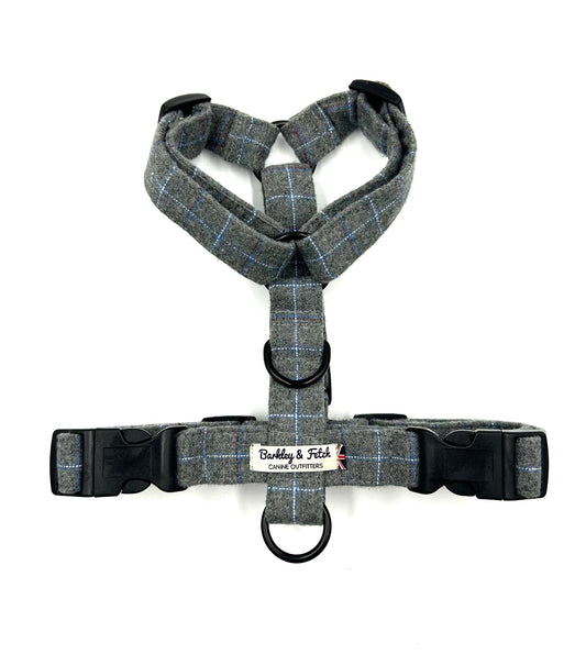 A grey windowpane check strap harness for dogs with adjustable straps and side release buckles, branded with 'Barkley & Fetch'.