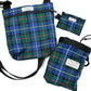 Three plaid bags in blue, green, and red on a white background