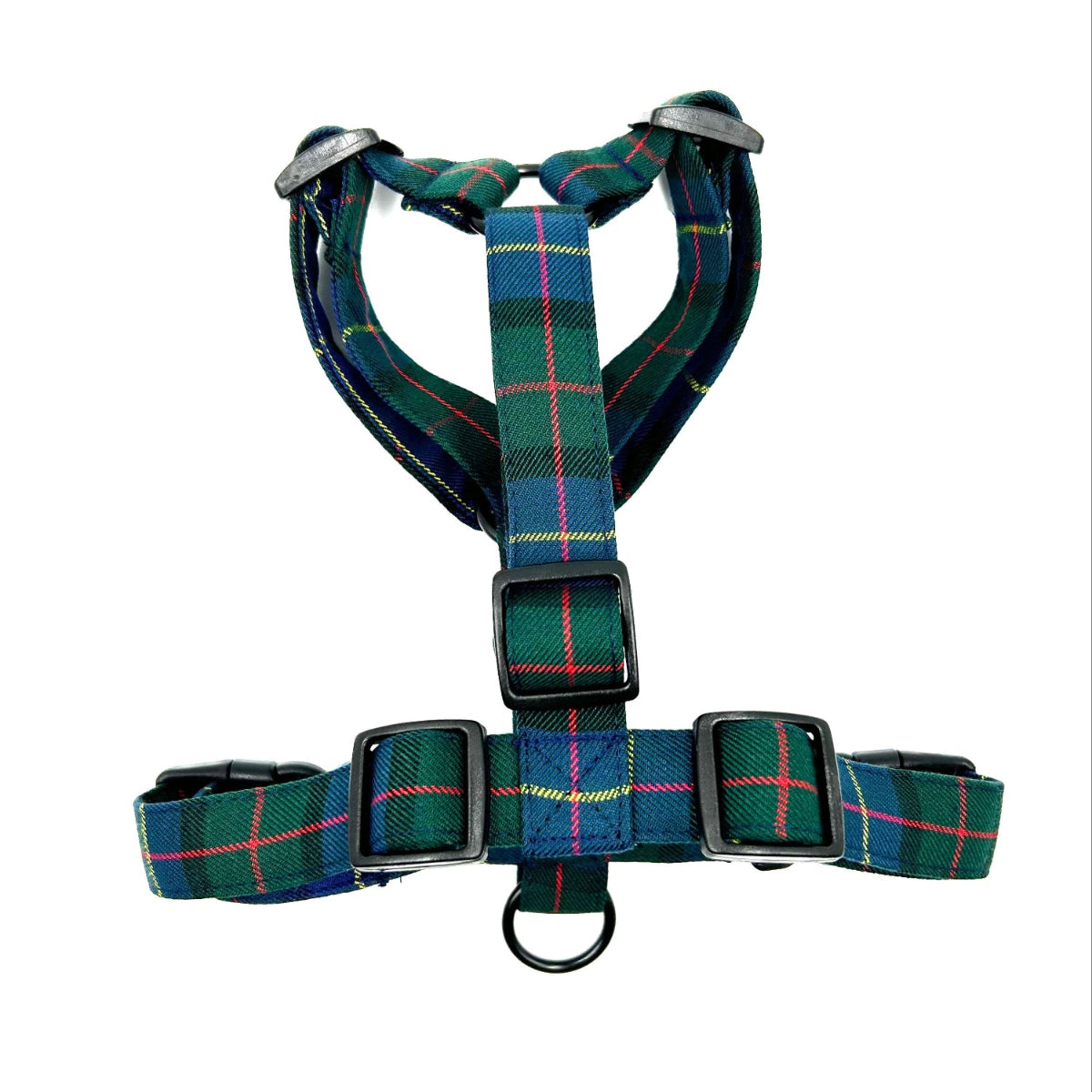 Plaid patterned dog harness on a white background