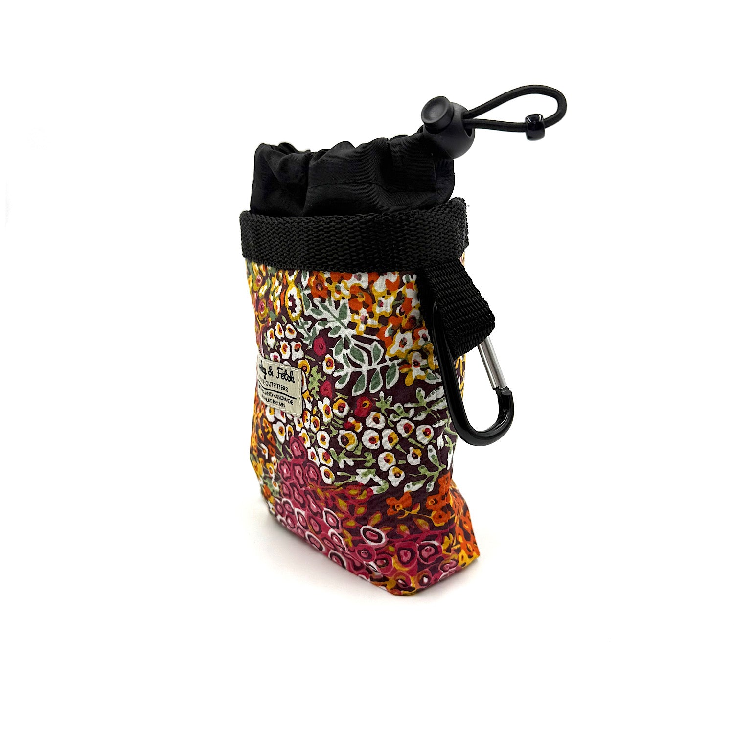 Colorful patterned pouch with a black drawstring and carabiner on a white background