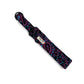 Patterned strap with a brand label on a white background