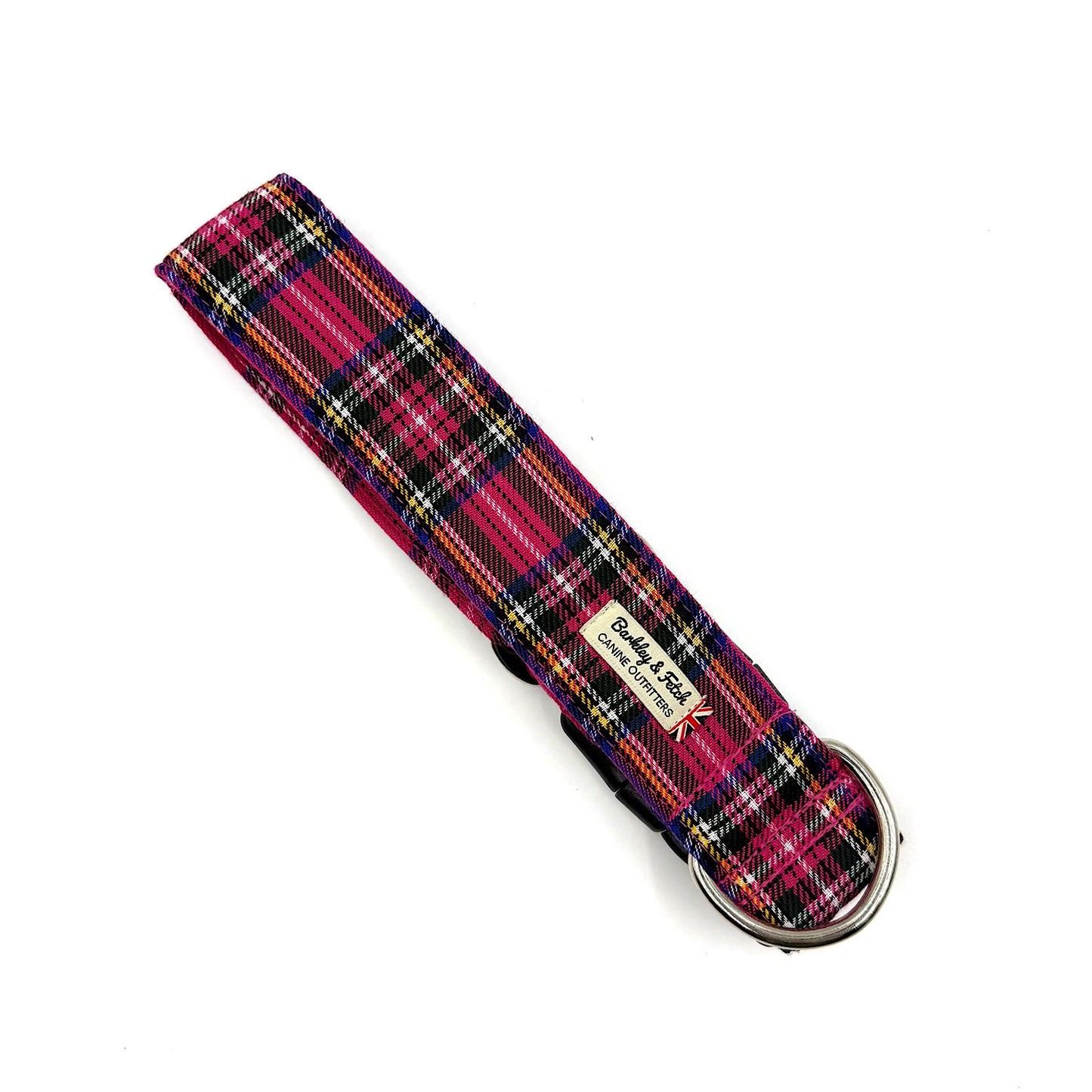 Plaid dog collar with a visible brand label on a white background