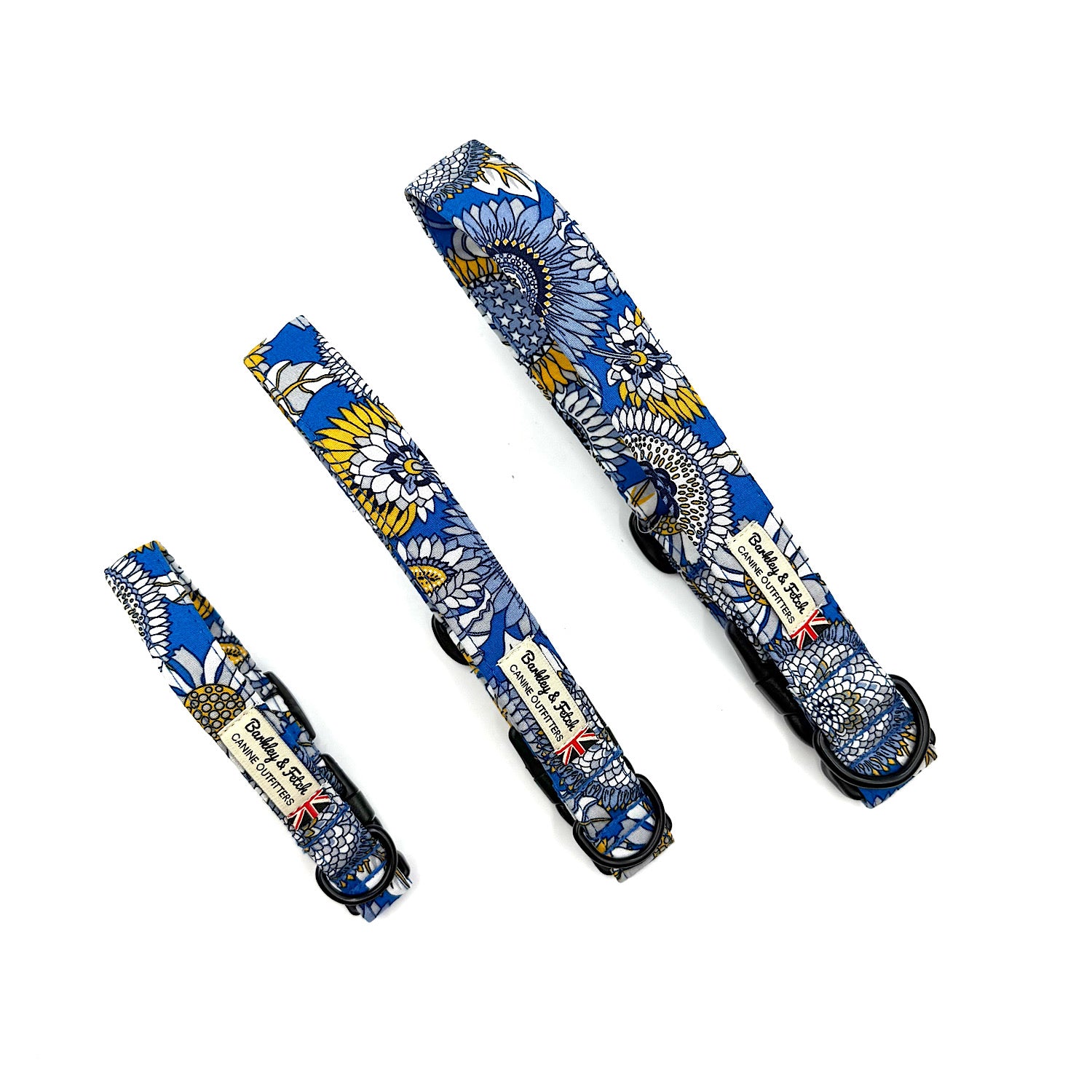 Set of three floral-patterned dog collars on a white background