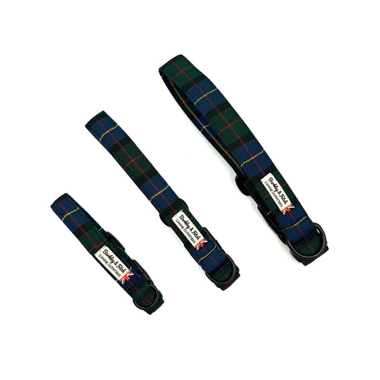 Three tartan dog collars with visible brand label on a white background