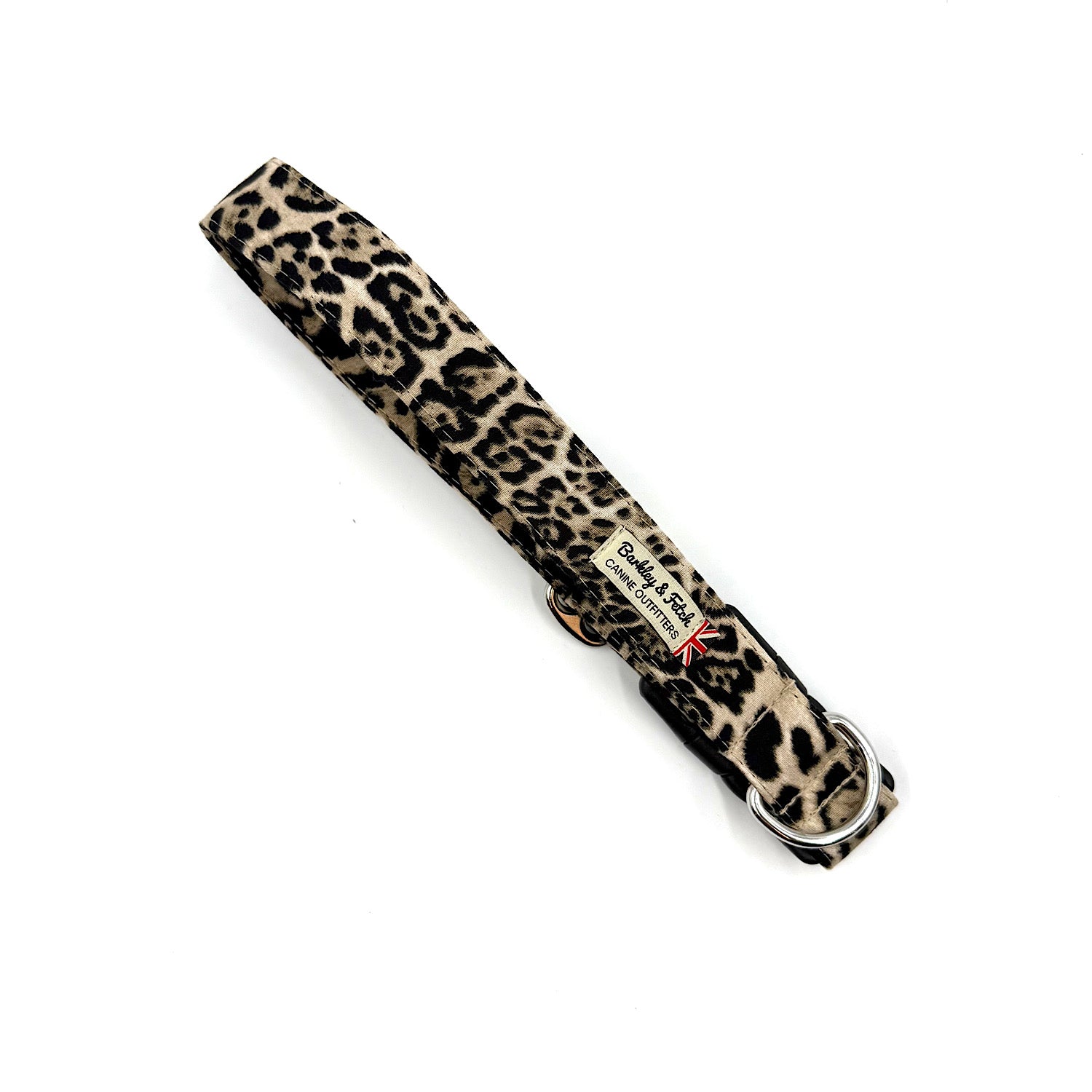 Leopard print dog collar with a brand label on a white background